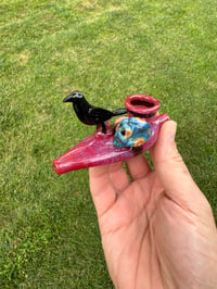 Image of Crow and skull bird bath kazoo 