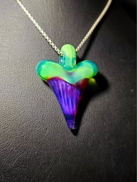 Image 1 of Shark tooth pendant made with royal jelly and green slyme.