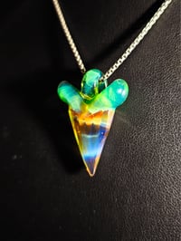 Image 1 of Shark tooth pendant made with orange elvis and sea slyme.