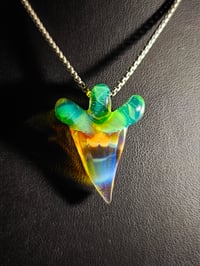 Image 2 of Shark tooth pendant made with orange elvis and sea slyme.