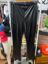 Image 1 of black faux leather flare pants 