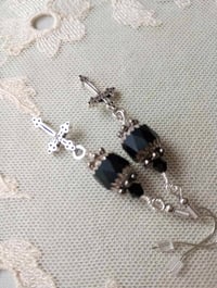 Image 8 of Gothic silver cross charm earrings handmade with faceted matt black faceted glass beads