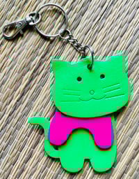 Image 1 of Light green and bright pink cat keychain