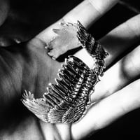 Image 2 of dead bird bracelet
