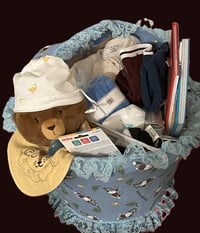 Image 2 of Baby in a basket