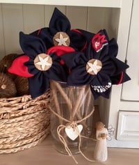 Image 3 of Memory Flowers custom created from a clients loved ones precious sports clothing