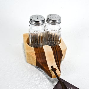 Image of Due Salt and Pepper Shaker holder and mini Walnut and Maple Cutting Board on the flip side