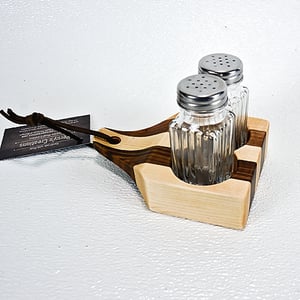 Image of Due Salt and Pepper Shaker holder and mini Walnut and Maple Cutting Board on the flip side