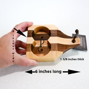 Image of Due Salt and Pepper Shaker holder and mini Walnut and Maple Cutting Board on the flip side