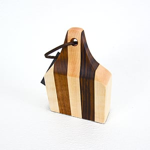 Image of Due Salt and Pepper Shaker holder and mini Walnut and Maple Cutting Board on the flip side