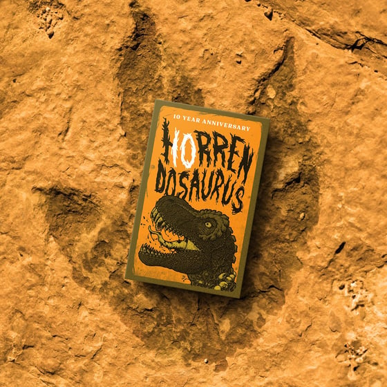 Image of HORRENDOSAURUS  '10 year anniversary' - Orange cassette