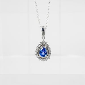 Image of 18ct white gold diamond and tanzanite pendant. PJ5583