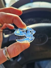 Image 1 of Mini moonstone T-rex skull pendant. 