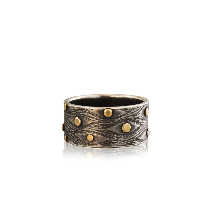 Image of the eyes have it, 18k yellow gold and oxidized silver band