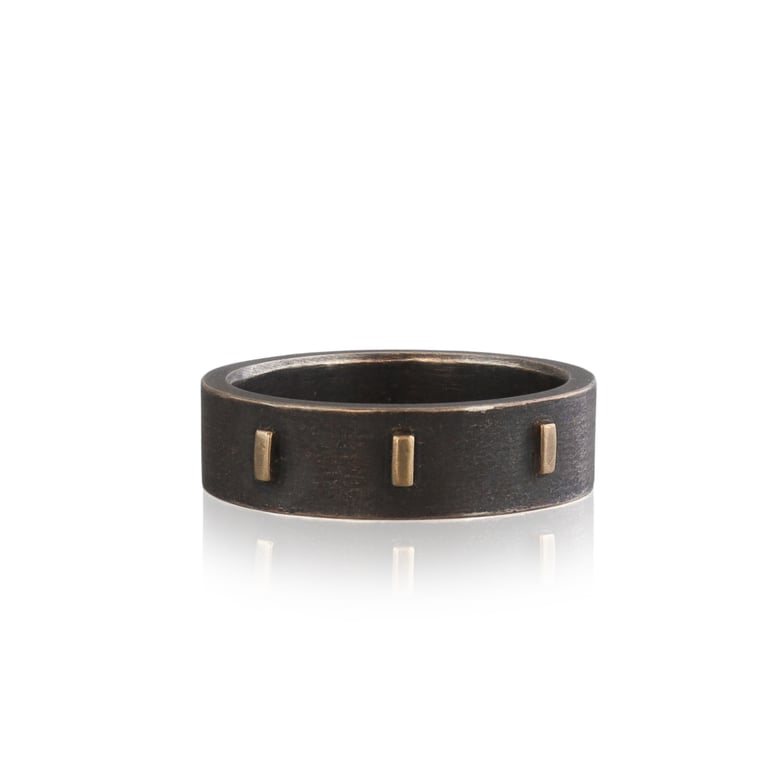 Image of structure ring with 14k yellow gold and oxidized silver