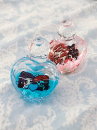 Image 2 of M.X.T.X Liquid Heart Bottles