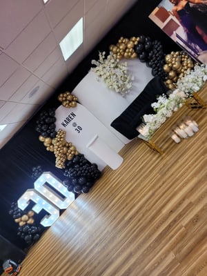 Image of Staging design black and white with balloons 