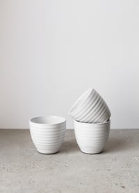 Image 1 of White ribbed curve cup