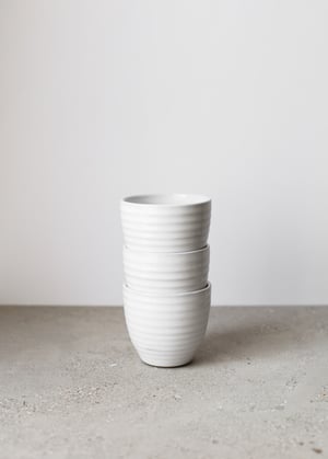 Image of White ribbed curve cup