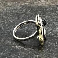 Image 2 of Silver ring, the resting brass snake.