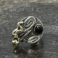 Image 1 of Silver ring, the resting brass snake.