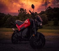 Image 1 of NAVi 110 Venom Cafe Black Fairing Windshield