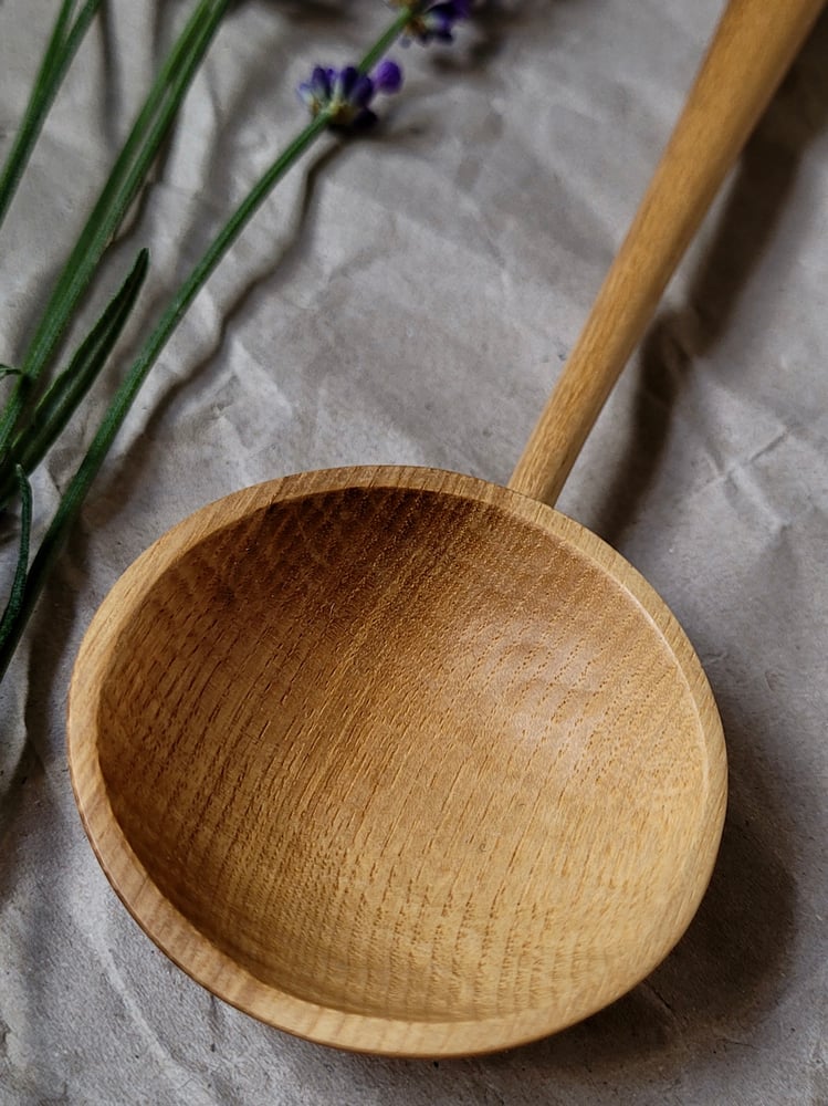 Image of Blue Handled Serving Spoon