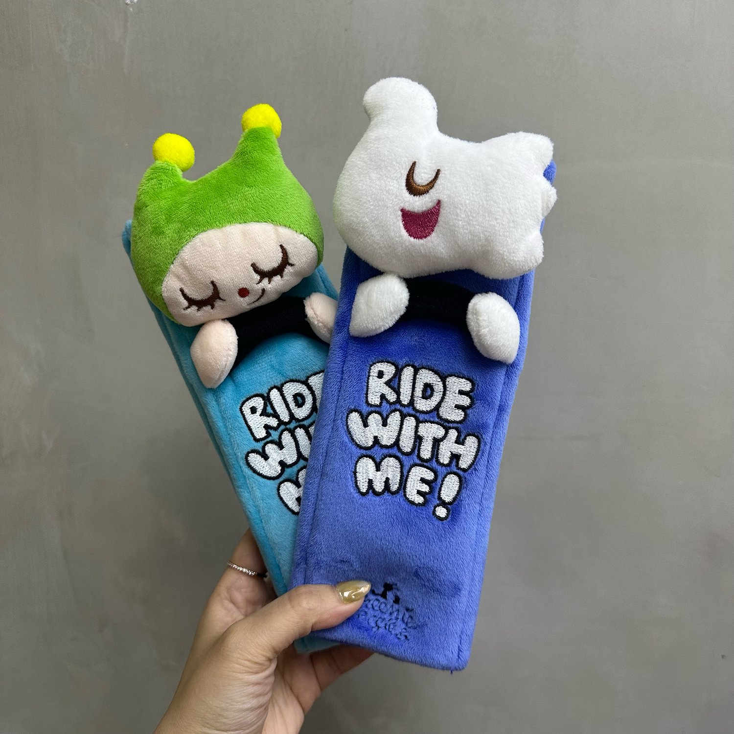 Image of GREENIE & ELFIE PLUSH SEATBELT COVER SET