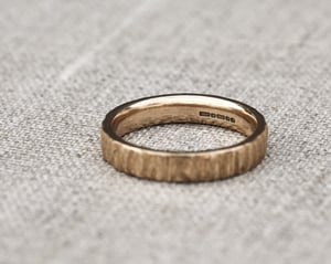 Image of 9ct Yellow gold 4mm flat court horn textured ring