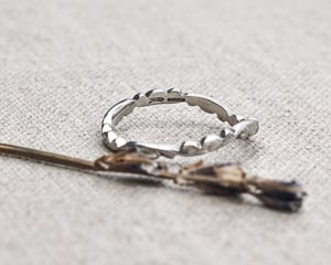 Image of Platinum 2mm floral carved wishbone ring