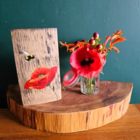 Image 1 of Wild Red poppy and bee.