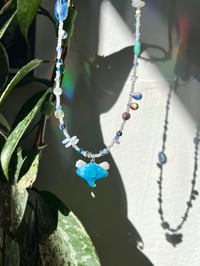Image 1 of baby spiral angel stingray necklace