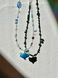 Image 4 of baby spiral angel stingray necklace