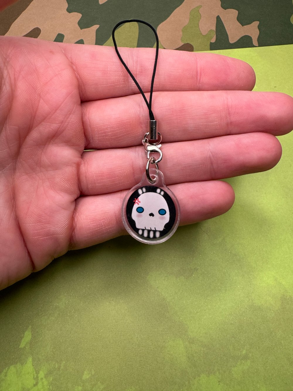 Image of Chibi Skull Face Guy Phone Charm