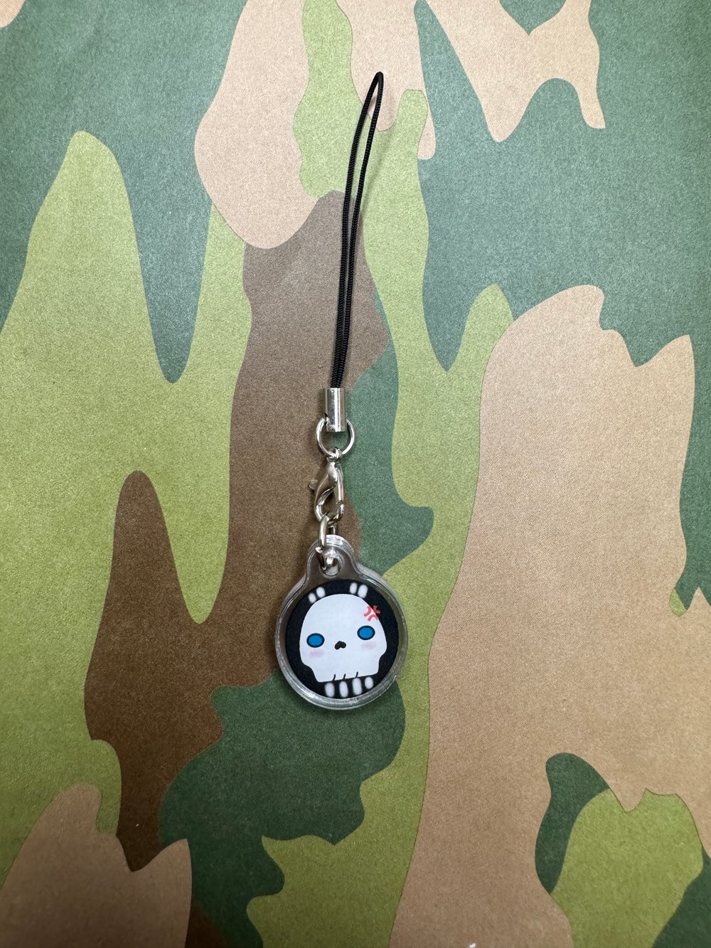Image of Chibi Skull Face Guy Phone Charm