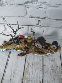 Image 2 of Driftwood. House by the river