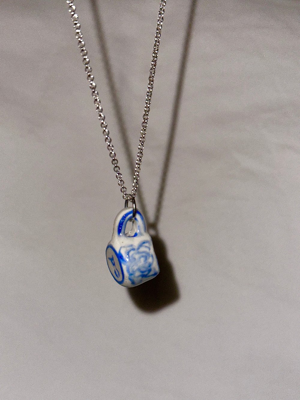 Image of rose flower teacup necklace