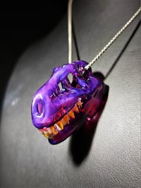 Image 3 of  Royal jelly T-rex skull pendant. (Mini)