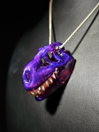 Image 1 of  Royal jelly T-rex skull pendant. (Mini)