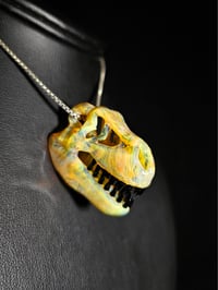 Image 2 of Ns yellow T-rex skull pendant. (Mini)