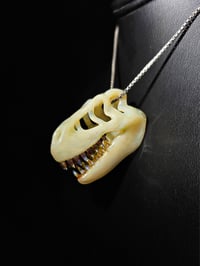 Image 2 of Wood glue T-rex skull pendant. (Mini)