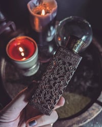 Filigree perfume bottle