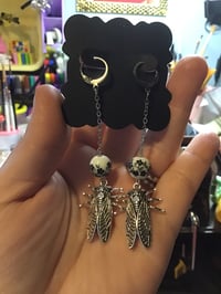 Sally the Cicada in black; Earrings