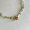 persimmon glass star green necklace