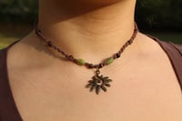 Image 1 of Jade Spiral sun 