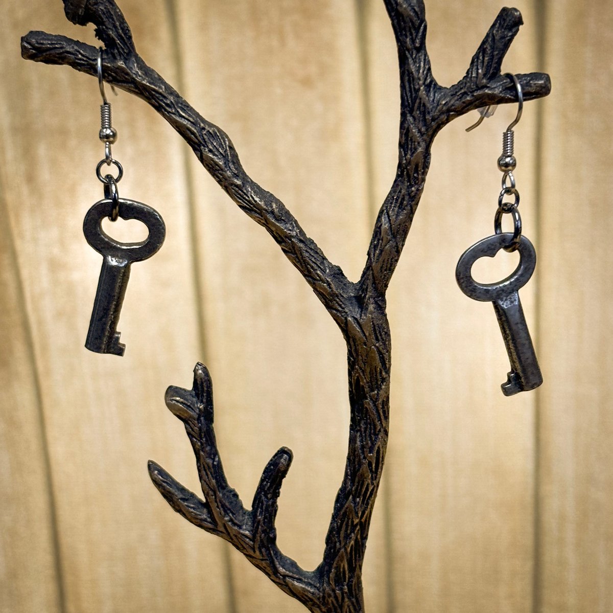 Tiny Heart-Shaped key earrings on surgical steel hooks
