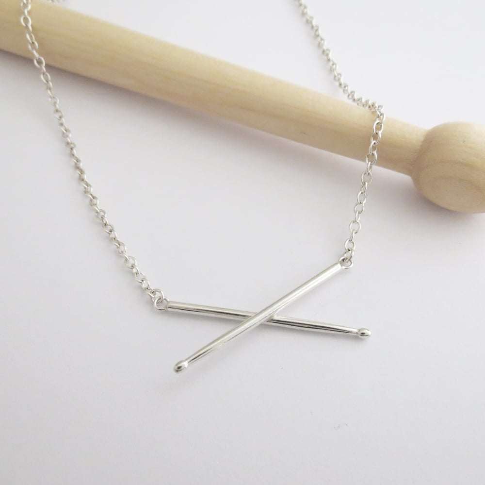 Image of Crossed Drumsticks