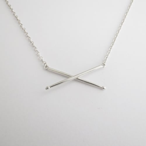 Image of Crossed Drumsticks