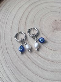 Image 3 of Stainless Steel Evil Eye Huggies
