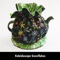 Image 1 of Traditional Round Tea Cozy - Kaleidoscope Snowflakes
